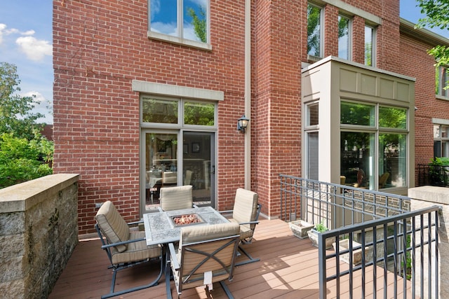 deck featuring a fire pit