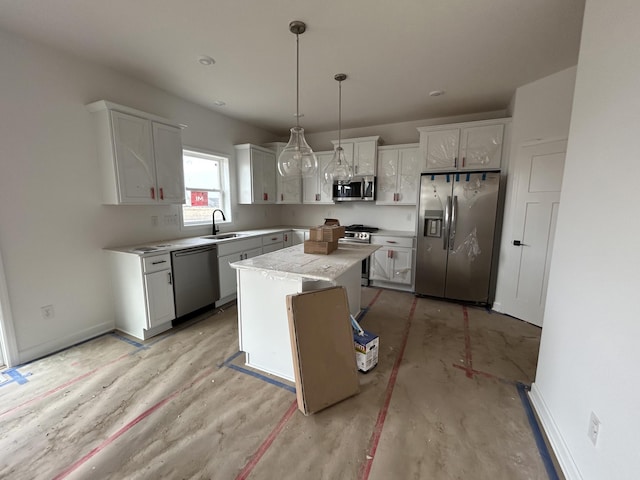 kitchen with a sink, stainless steel appliances, white cabinets, and light countertops