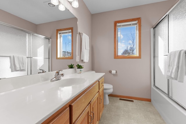 full bathroom featuring tile patterned floors, visible vents, toilet, baseboards, and vanity