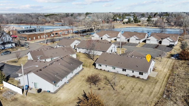 birds eye view of property with a residential view