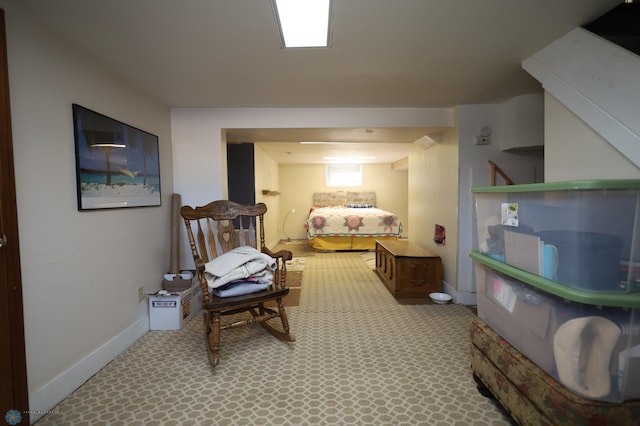 carpeted bedroom with baseboards