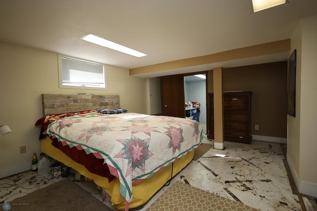 bedroom with baseboards