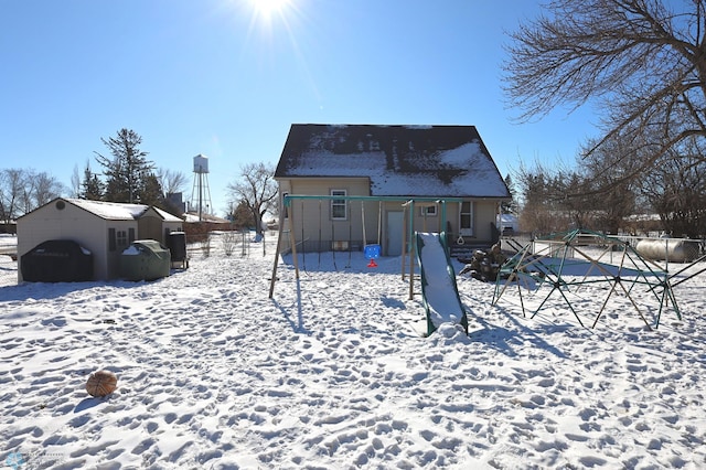 view of snow covered house