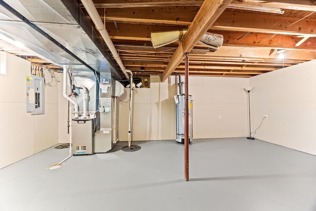 unfinished basement featuring electric panel, gas water heater, and heating unit