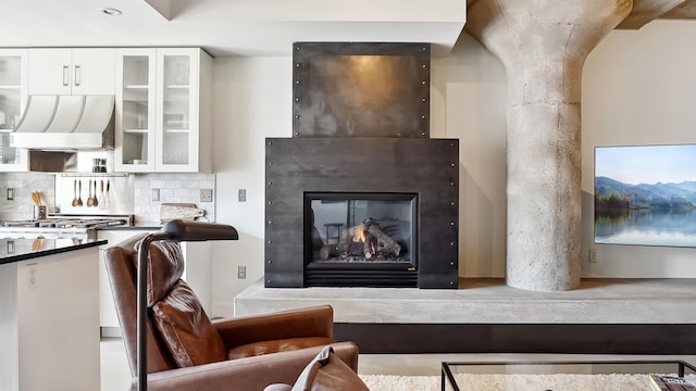 sitting room featuring a fireplace