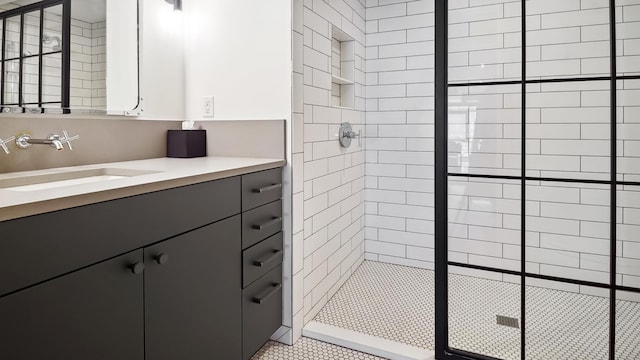 full bathroom featuring a stall shower and vanity