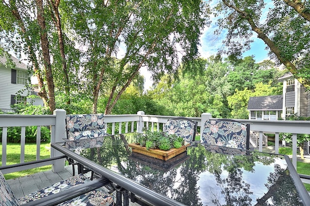 view of wooden balcony with a wooden deck