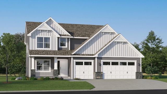 craftsman-style house with a shingled roof, concrete driveway, board and batten siding, a garage, and a front lawn