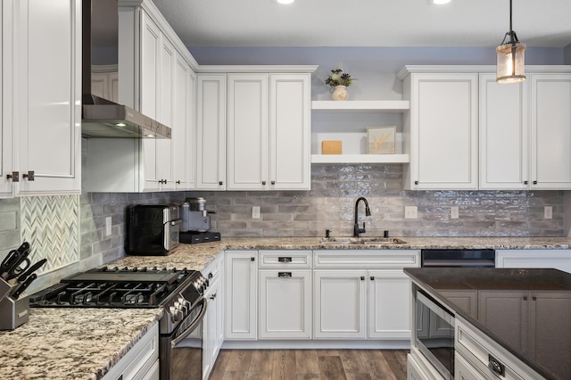 kitchen featuring range with gas cooktop, white cabinetry, wall chimney exhaust hood, and open shelves