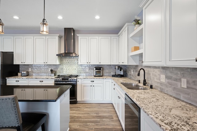 kitchen featuring white cabinets, dishwashing machine, wall chimney exhaust hood, open shelves, and stainless steel range with gas stovetop