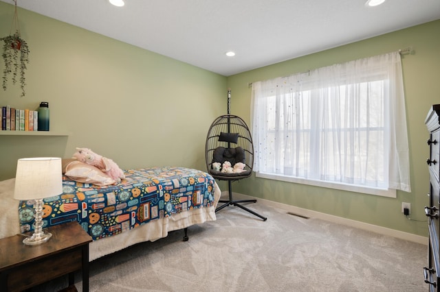 bedroom with carpet floors, recessed lighting, visible vents, and baseboards