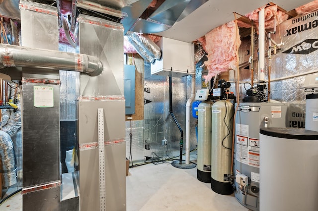 utility room featuring gas water heater, electric panel, and heating unit