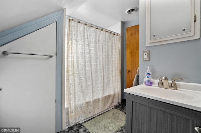 full bathroom with visible vents and vanity