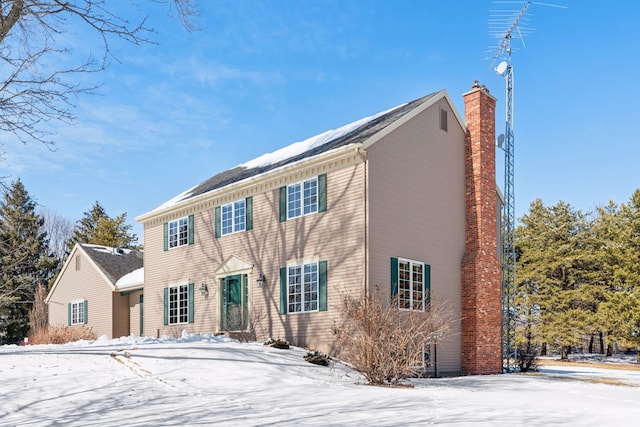 colonial home with a chimney