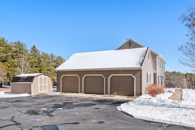 garage with a storage shed