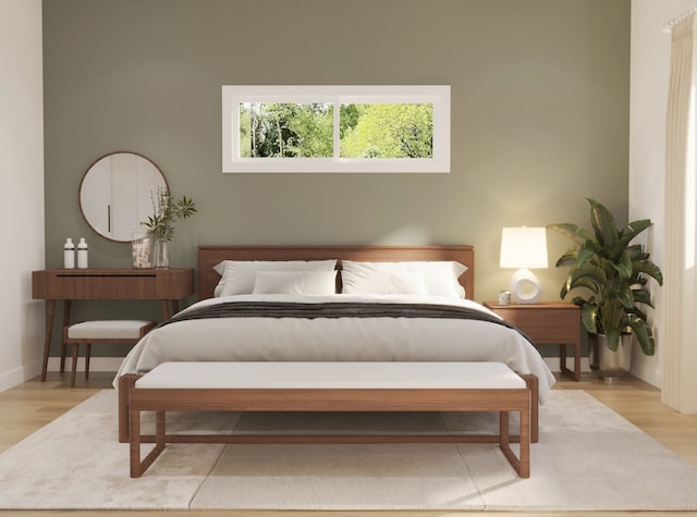 bedroom featuring light wood-style flooring