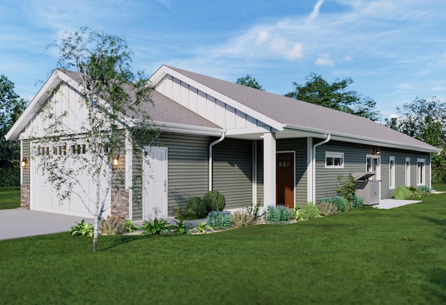 view of front of house featuring a garage, board and batten siding, and a front yard