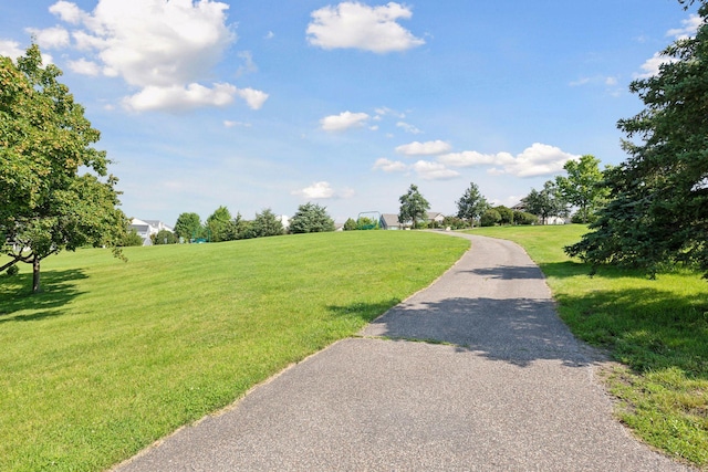 view of road featuring aphalt driveway