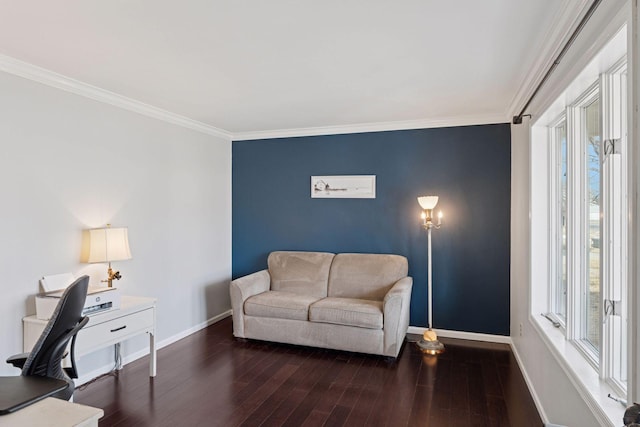 office area with wood finished floors, baseboards, and ornamental molding