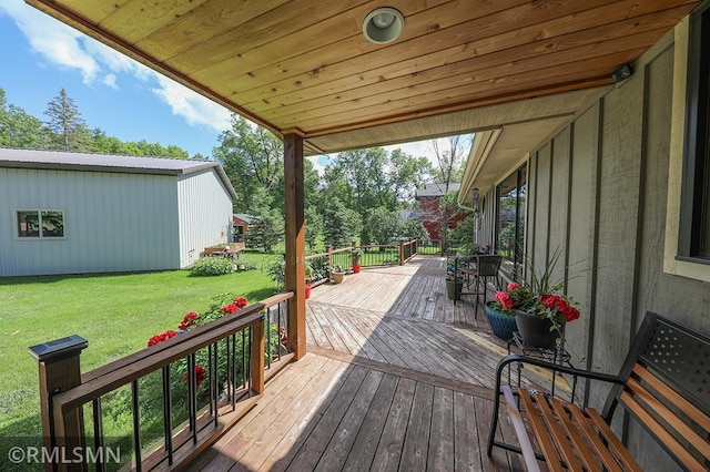 wooden deck with a yard