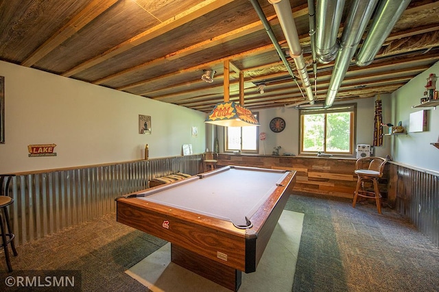 game room with carpet floors, wood walls, pool table, and wainscoting