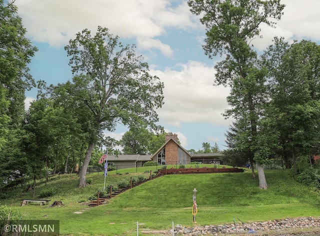 view of front of property with a front lawn