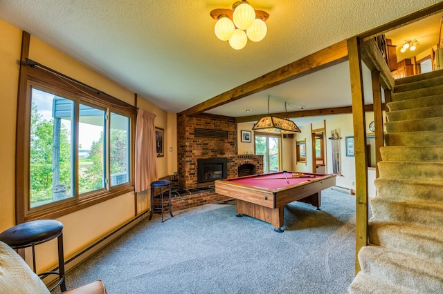 rec room featuring carpet flooring, a textured ceiling, a brick fireplace, a baseboard heating unit, and beam ceiling