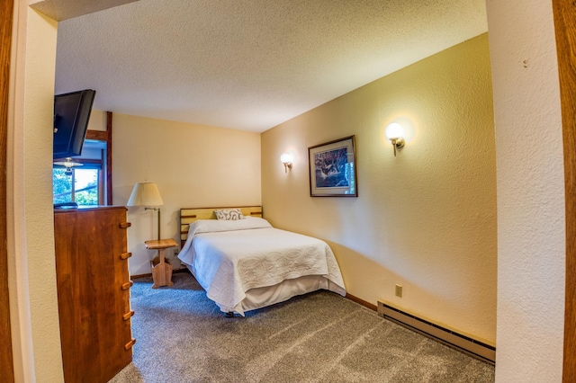 bedroom featuring baseboards, a textured wall, a baseboard radiator, a textured ceiling, and carpet floors