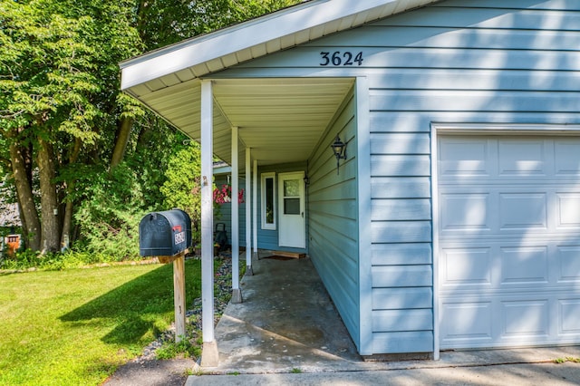 exterior space with a garage and a yard