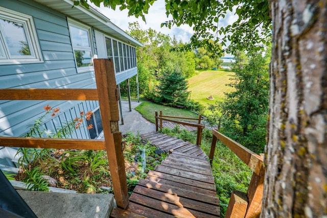 view of yard with a wooden deck