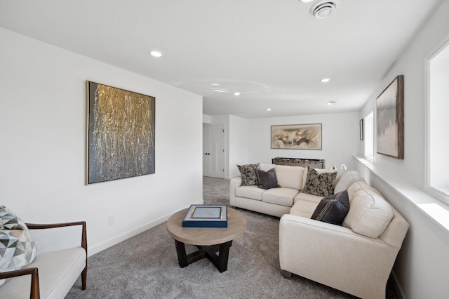 carpeted living room featuring recessed lighting and baseboards