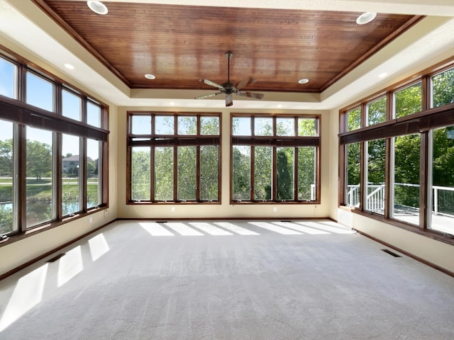 2464 Tournament Players Cir N, Blaine, MN 55449 - unfurnished sunroom with wood ceiling, a raised ceiling, carpet floors, healthy amount of natural light, and recessed lighting