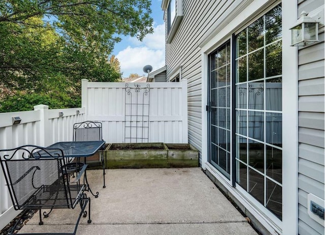 view of patio with fence