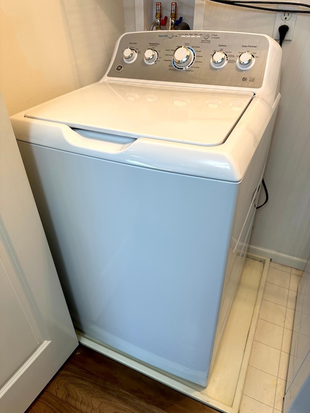 washroom with washer / clothes dryer and laundry area