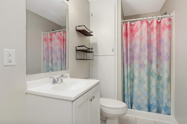 bathroom with toilet, a stall shower, a textured ceiling, and vanity