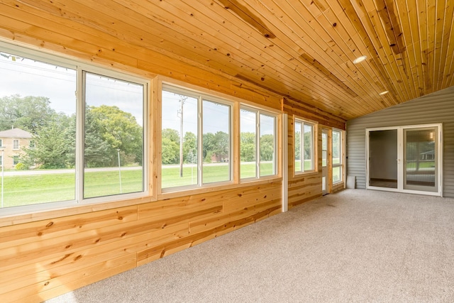 unfurnished sunroom with lofted ceiling and wooden ceiling