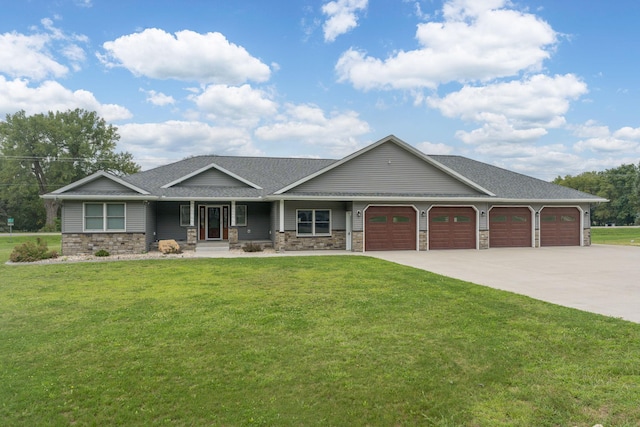 view of front facade featuring a garage, stone siding, a front lawn, and concrete driveway