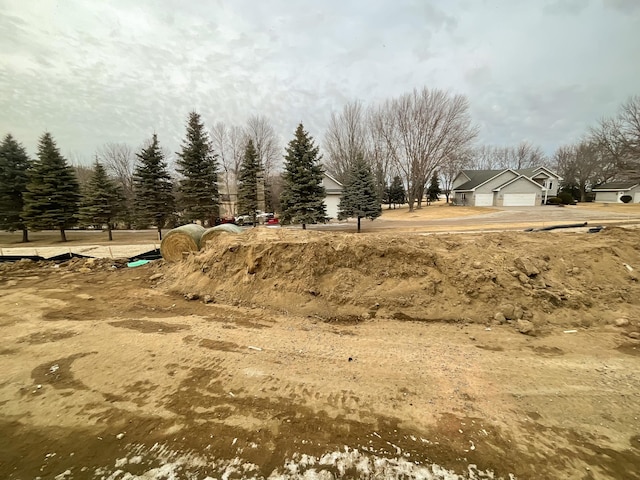 view of yard with a garage