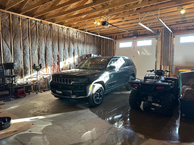 garage featuring a garage door opener