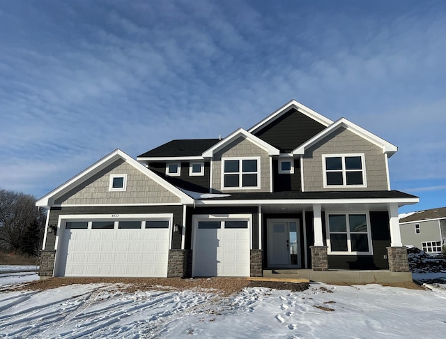 craftsman-style home featuring covered porch