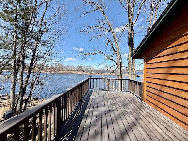 deck featuring a water view