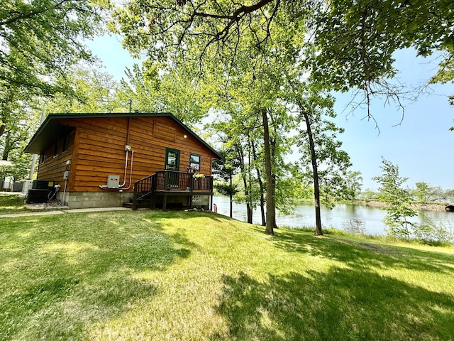 51879 186th Pl, Mcgregor, MN 55760 - back of house with a water view, a lawn, and cooling unit