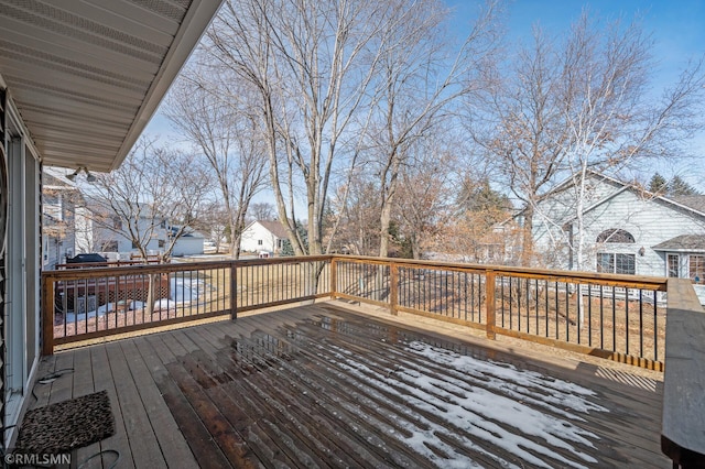 view of snow covered deck