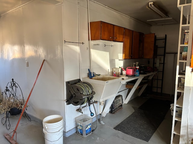 kitchen with concrete floors and brown cabinets