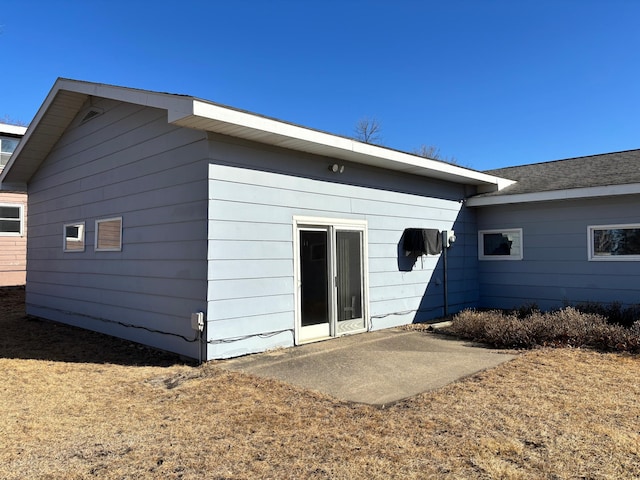 back of house with a patio area