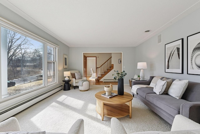 carpeted living area with stairway, visible vents, a baseboard radiator, ornamental molding, and baseboard heating