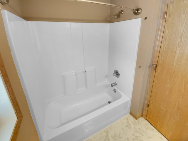 bathroom featuring shower / washtub combination