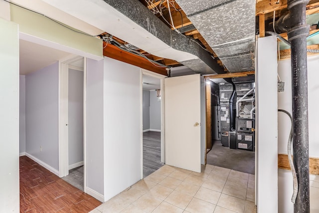 unfinished basement featuring baseboards