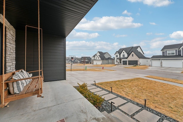 view of patio with a residential view