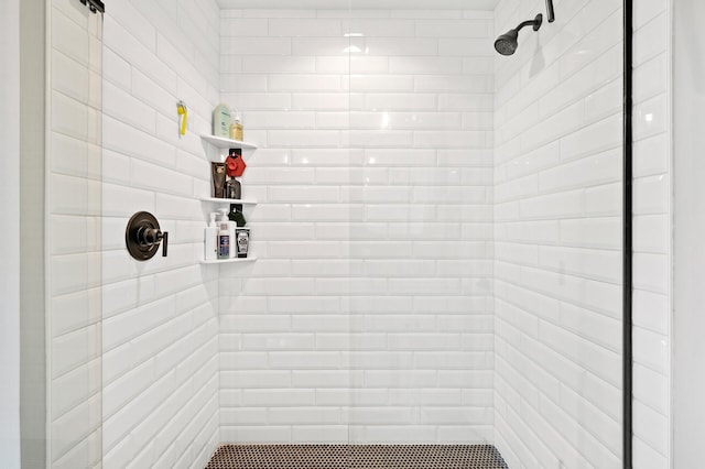 interior space with a tile shower